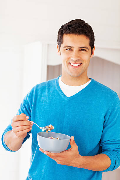istock Happy Man Having Bowl Of Cereals 172454906