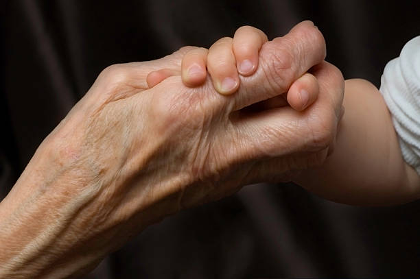 istock Grandmother's and child's hands 172455297