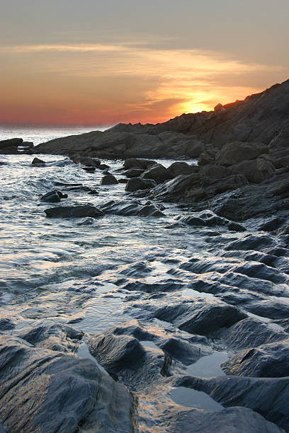 istock Sunset at a rocky beach in Cornwall, England 172455312