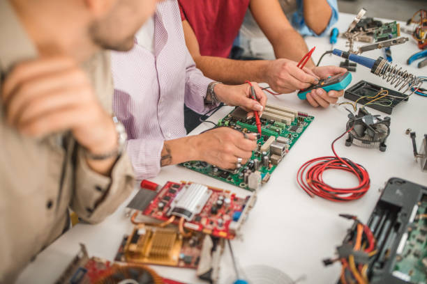 istock A close-up of the hands of students using electronic equipment during electronics class 1724556710