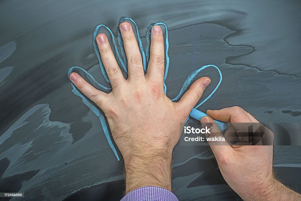 size of the hand on blackboard Adult Stock Photo