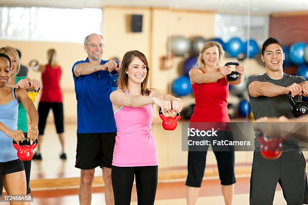 Kettlebell Fitness Class Stock Photo - Download Image Now - 40-49 Years, Group Of People, Indoors