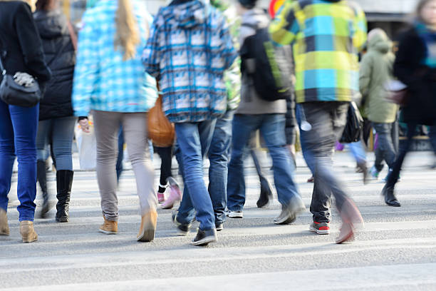 istock Pedestrians crossing street 172456537