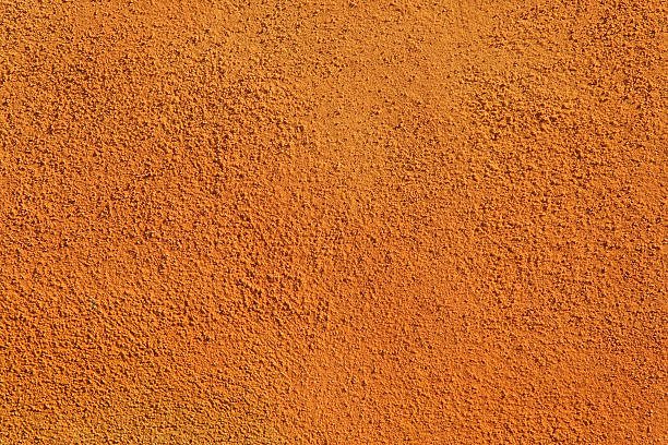 fondo de pared de orange - rough cast fotografías e imágenes de stock