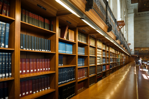 Books in a shelf at the library.