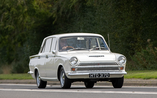 Pembrokeshire, United Kingdom - September 10, 2023: Morris Minor car - known as the 'Moggie' and built in England from 1948 until 1972, photographed at a rally at Scolton Manor, Pembrokeshire, Wales, to celebrate the 75th Anniversary of the marque.