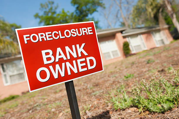 Foreclosure Sign in yard stock photo