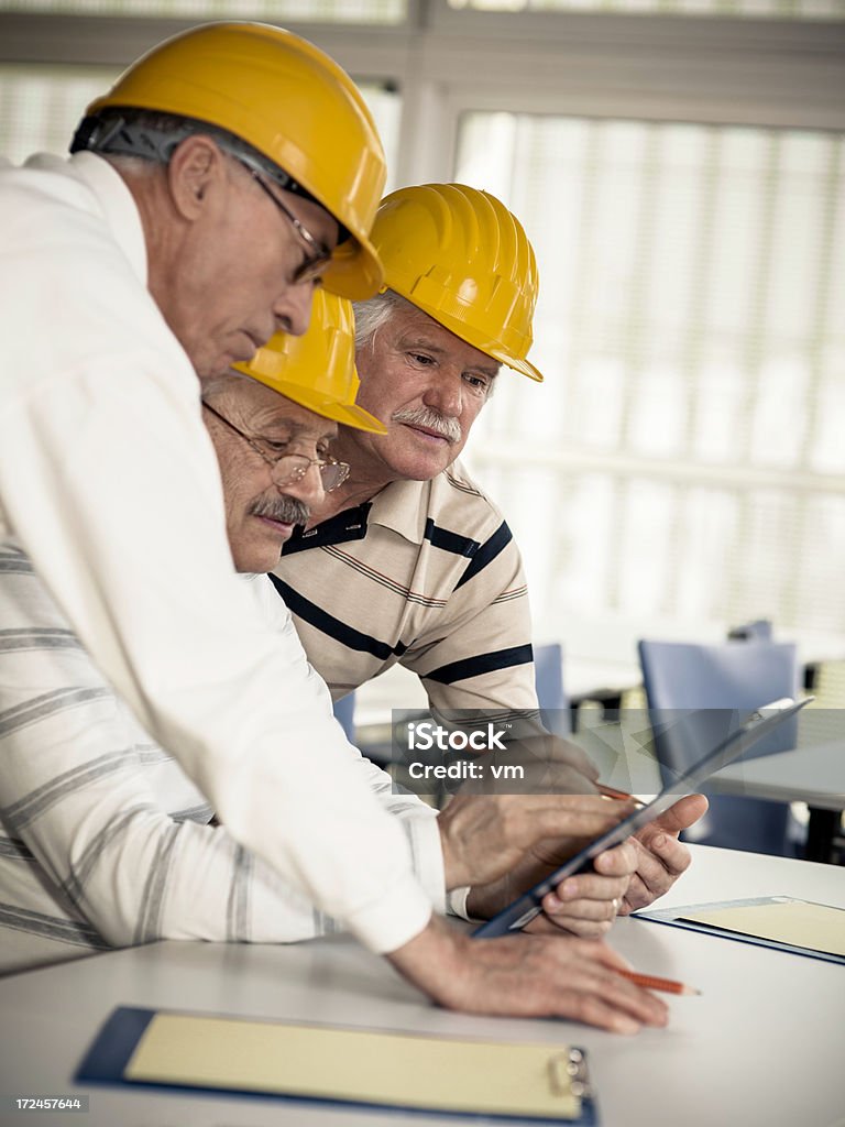 Équipe de Construction - Photo de Adulte libre de droits