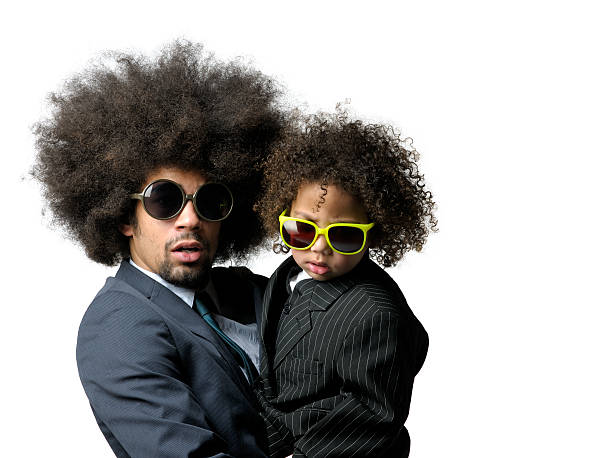Man Carrying Little Boy With Big Hair And Sunglasses Stock Photo - Download  Image Now - iStock
