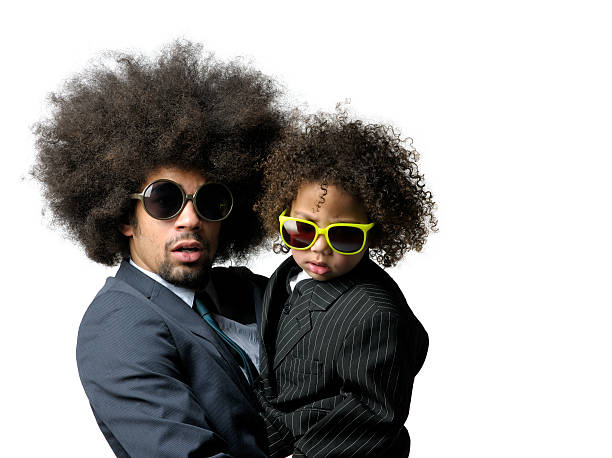 Man Carrying Little Boy With Big Hair And Sunglasses Stock Photo - Download Image Now - iStock Man Carrying Little Boy With Big Hair And Sunglasses Stock Photo - Download Image Now - iStock