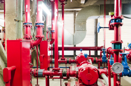 Water pumping station and industrial interior pipes in highrise building office