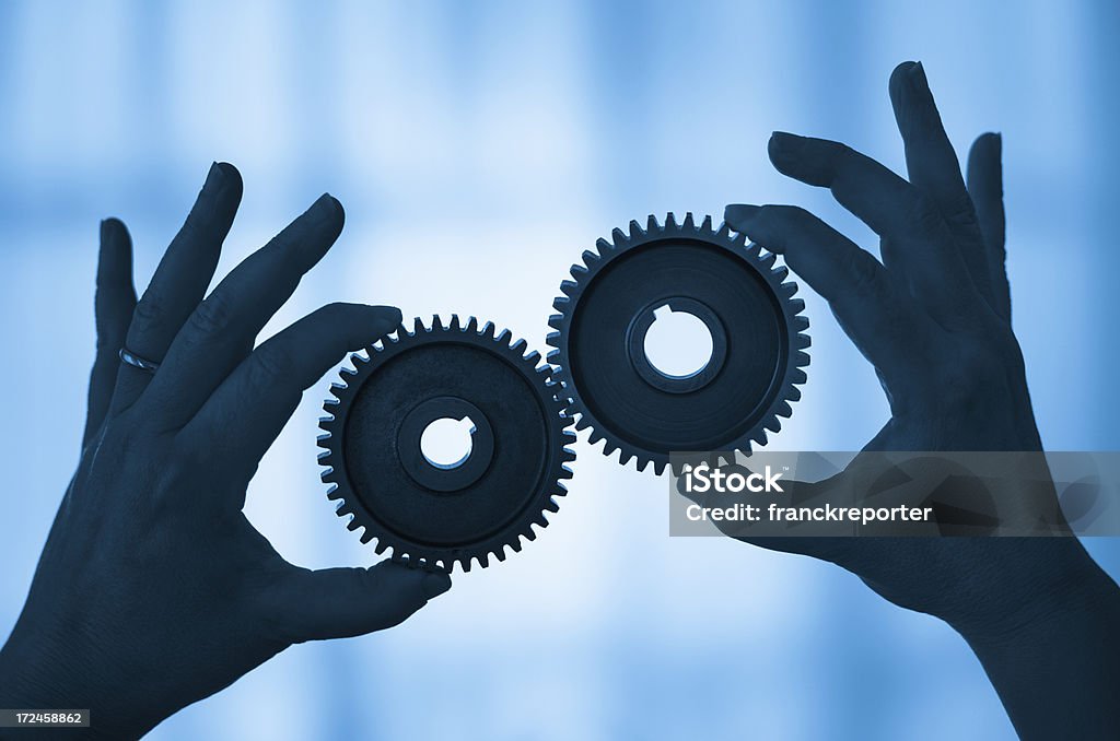Hands controlling Gear working togetherness  Accuracy Stock Photo