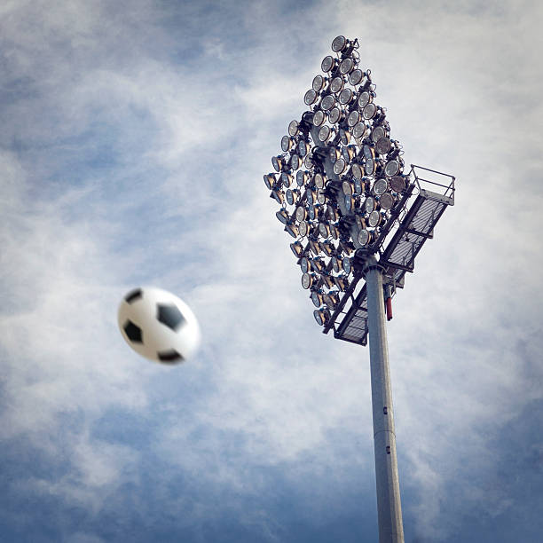 football-tag - floodlight blue sky day stock-fotos und bilder