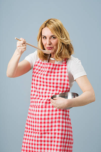 istock Mature woman cooking 172459518