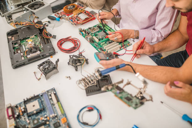 istock An unrecognizable female professor shows students how a multimeter works in an electronics class 1724595219