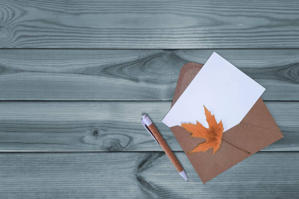 istock Blank letter with autumn theme. Top view. 1724597956