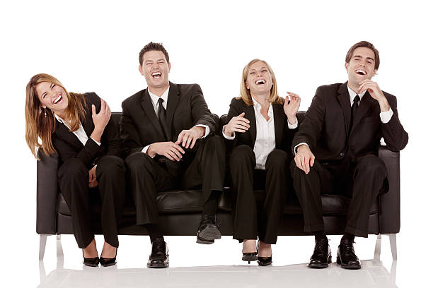 istock Business team sitting on a couch and laughing 172459832