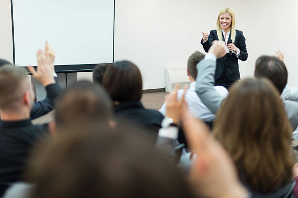 istock Young businesswoman with microphone 172459958