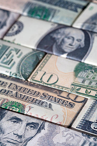 istock US Dollar Bill American Money Brick Wall 172461115