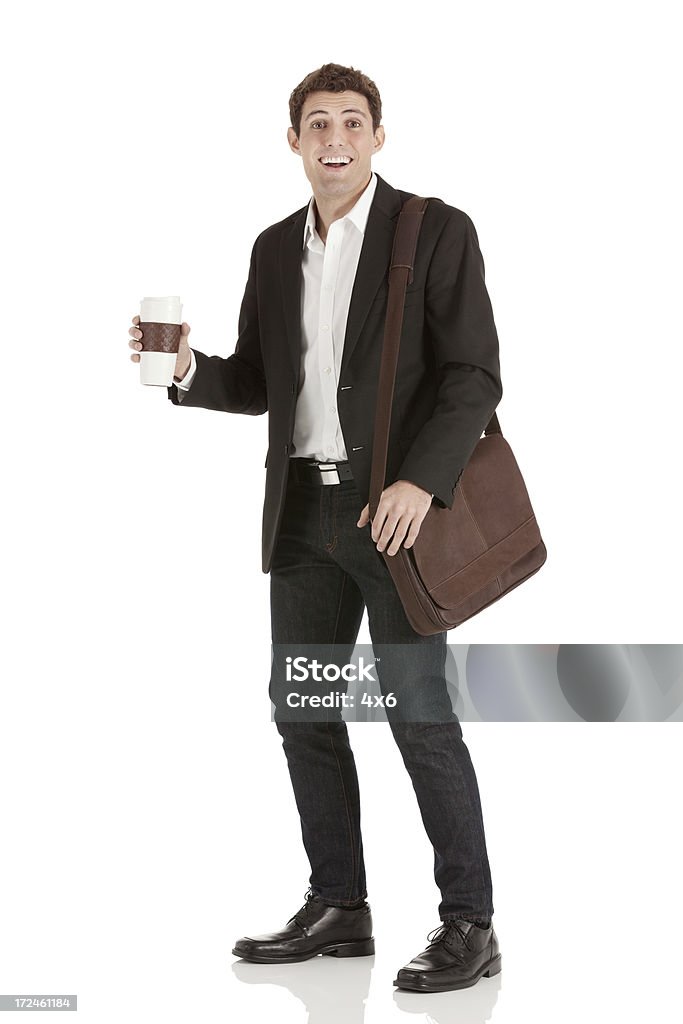 Sorridente empresário com uma xícara de café - Foto de stock de 20 Anos royalty-free
