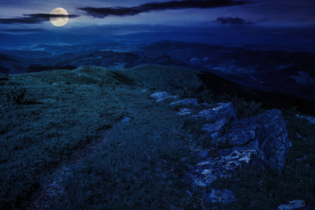 istock sharp boulders on the hillside meadow in high Crapathian mountains at night 1724618411