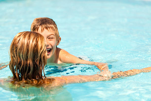 istock Mother and son swimming 172462119