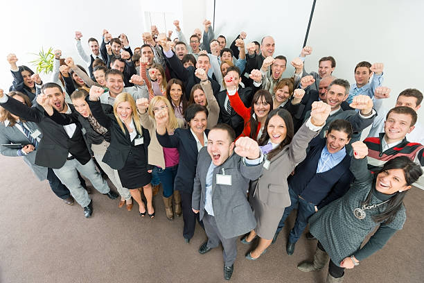 istock Business people holding fists up. 172462123