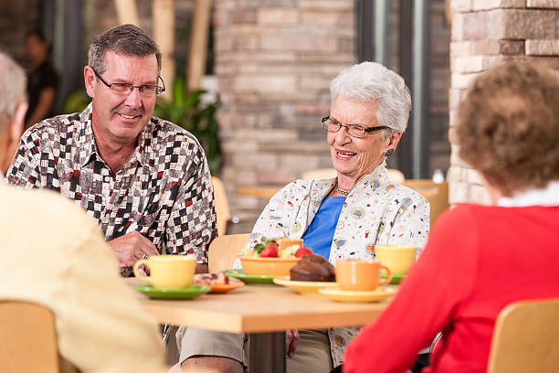 istock Mature Adults Enjoying Breakfast Together 172462164