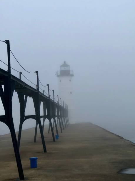 istock The Manistee North Pierhead Lighthouse in fog 1724623219