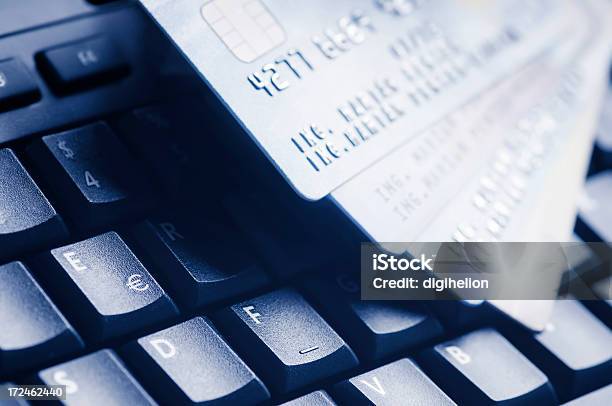 Credit Cards On Computer Keyboard Stock Photo - Download Image Now - Accessibility, Banking, Blue