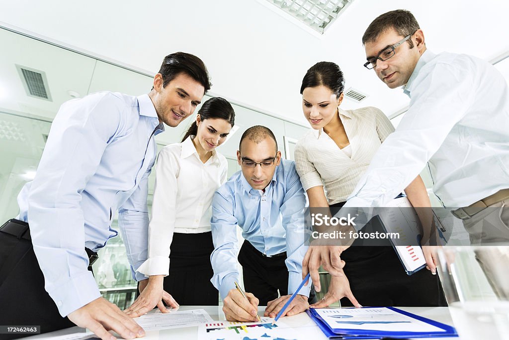 Equipe de negócios em uma reunião - Foto de stock de 20 Anos royalty-free