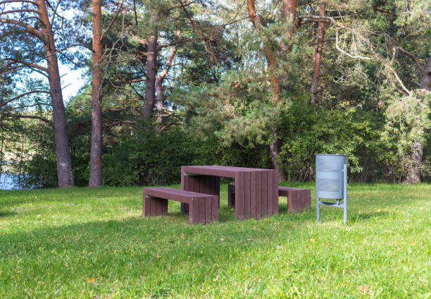 istock Wooden benches and table in park 1724624802