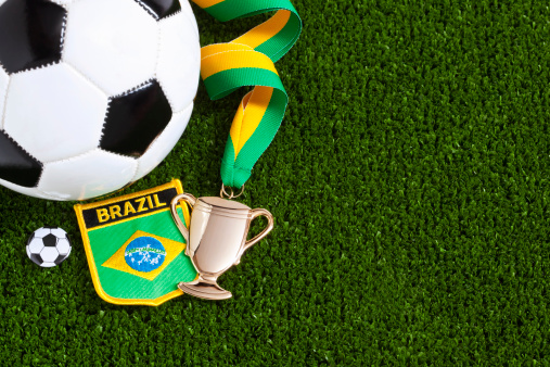 The 2014 World Cup Football Championship will take place between 12 June and 13 July 2014 and will be hosted by Brazil. Good copy space.