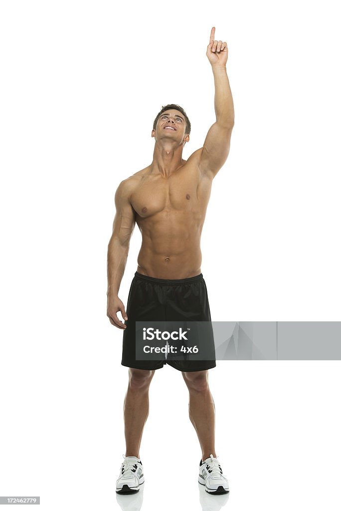 上半身裸の男性向けに設定 - 立てた指のロイヤリティフリーストックフォト
