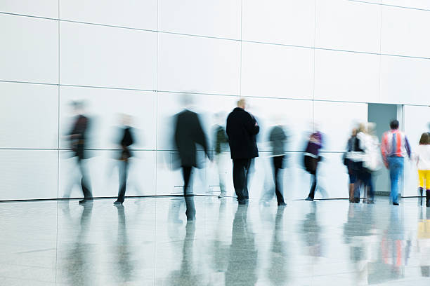 istock People Walking in Hallway, Motion Blur 172463344