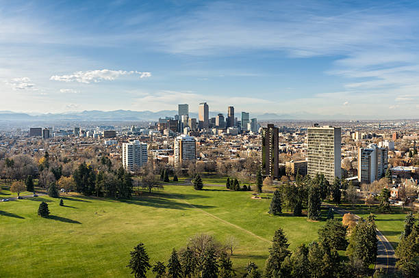View of Denver Colorado Skyline View of Denver Colorado Skyline.  Looking at city with mountains in background - Cheeseman Park.  Converted from 14-bit Raw file.  sRGB color space. denver stock pictures, royalty-free photos & images