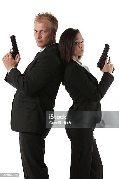 Secret Agents With Hand Guns Stock Photo - Download Image Now - Gun, Men, Spy