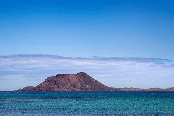 Lobos Island "Isla de Lobos or Lobos Island, a small volcanic rock island north of Fuerteventura, Canary Islands." point lobos state reserve stock pictures, royalty-free photos & images