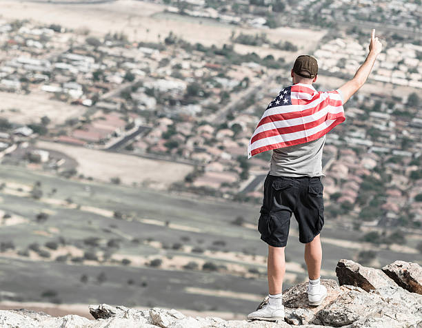 istock Man with us flag against phoenix panorama 172464887