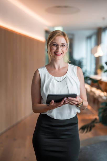 istock Mid Adult Female Executive with Digital Tablet 1724655824
