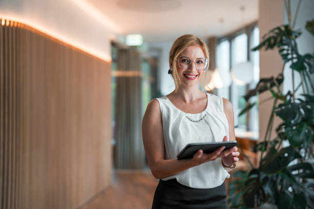 istock Focused Businesswoman Engaged with Digital Technology 1724656364