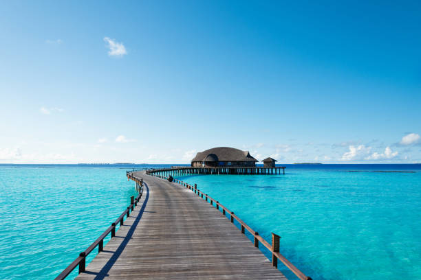 Wooden villas over water of the Indian Ocean, Maldives