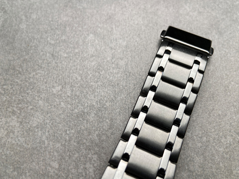 Scratched titanium watch band with copy space