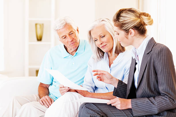 istock Advisor Explaining Investment Scheme To Senior Couple 172466655