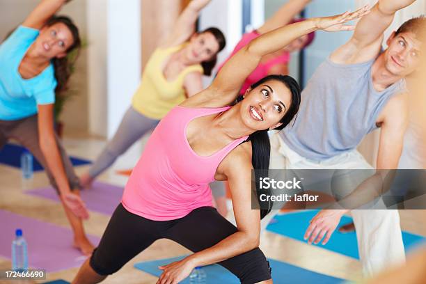 Stretching Away To Fitness Stock Photo - Download Image Now - Active Lifestyle, Adult, Arms Outstretched
