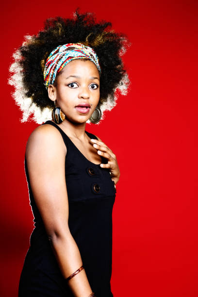 istock Who me? Shocked young afro-haired woman protests  her innocence 172466829
