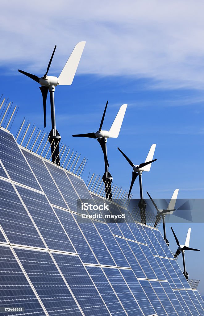 Renewable Energy Solar panels and wind turbines Concepts Stock Photo