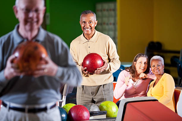 istock Seniors at bowling alley 172467231
