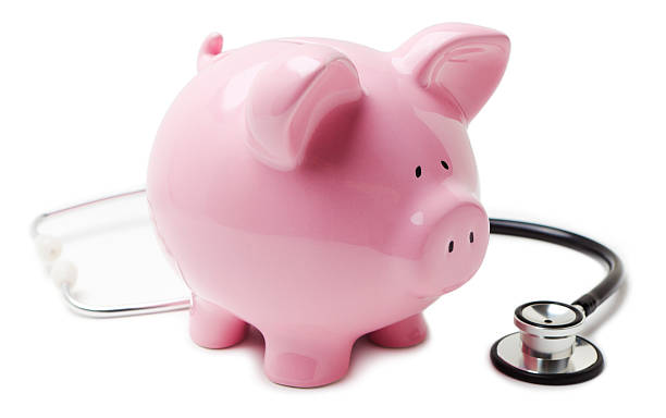 istock Stethoscope and piggy bank 172467472