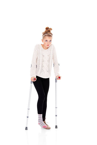 istock Little girl with broken foot looking upset 172467536